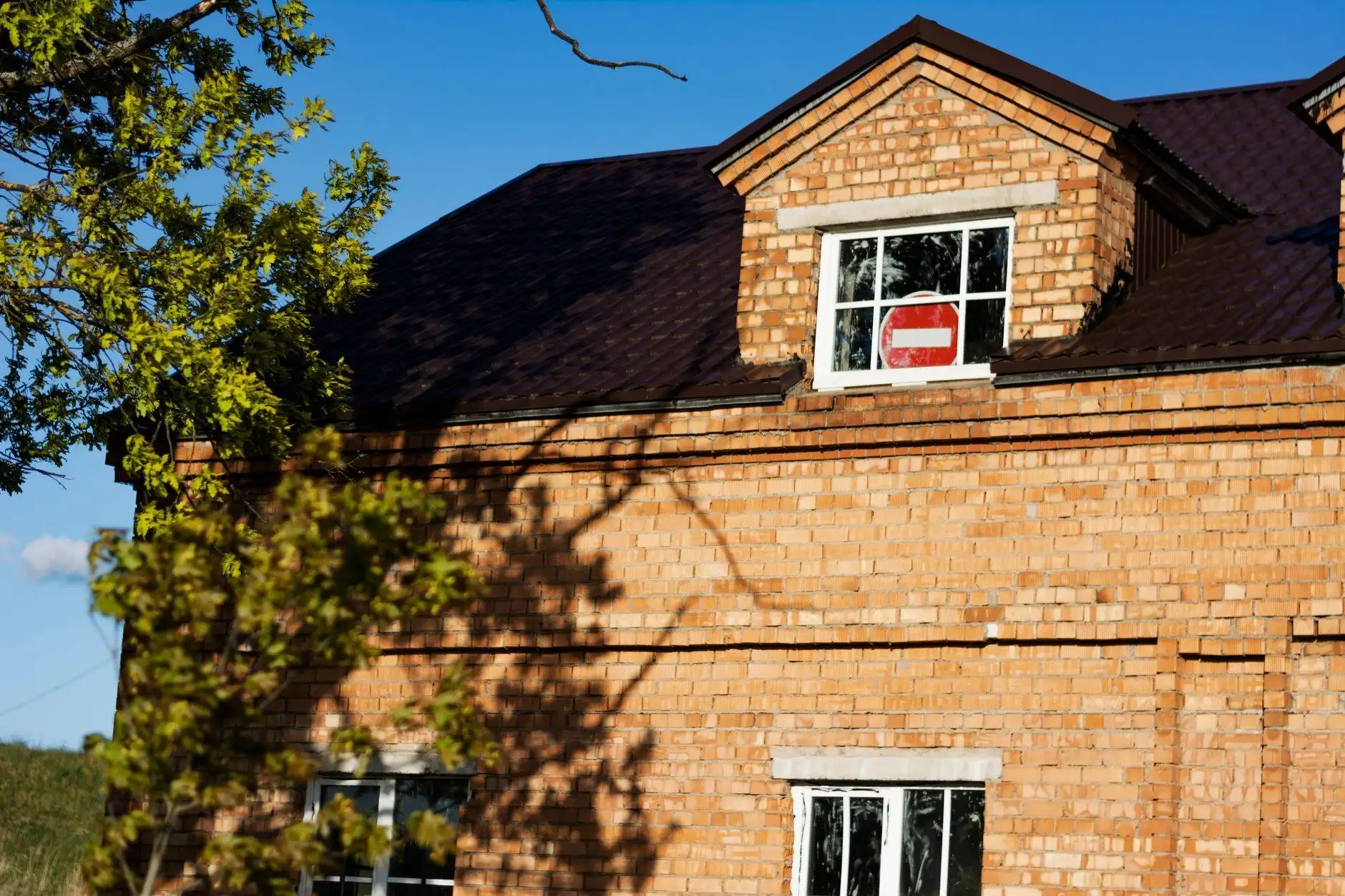 Evanston Tuckpointing Pros crew restoring mortar joints on a residential brick wall